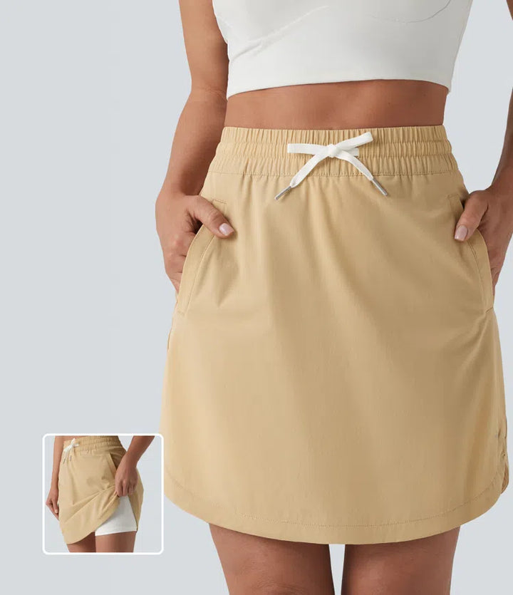 High Waisted Drawstring 2-in-1 Curved Hem Mini Golf Skirt with Pockets-Longer Length